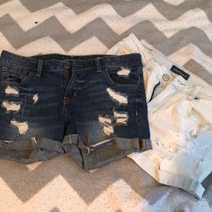 High waisted light wash shorts and dark wash midi shorts